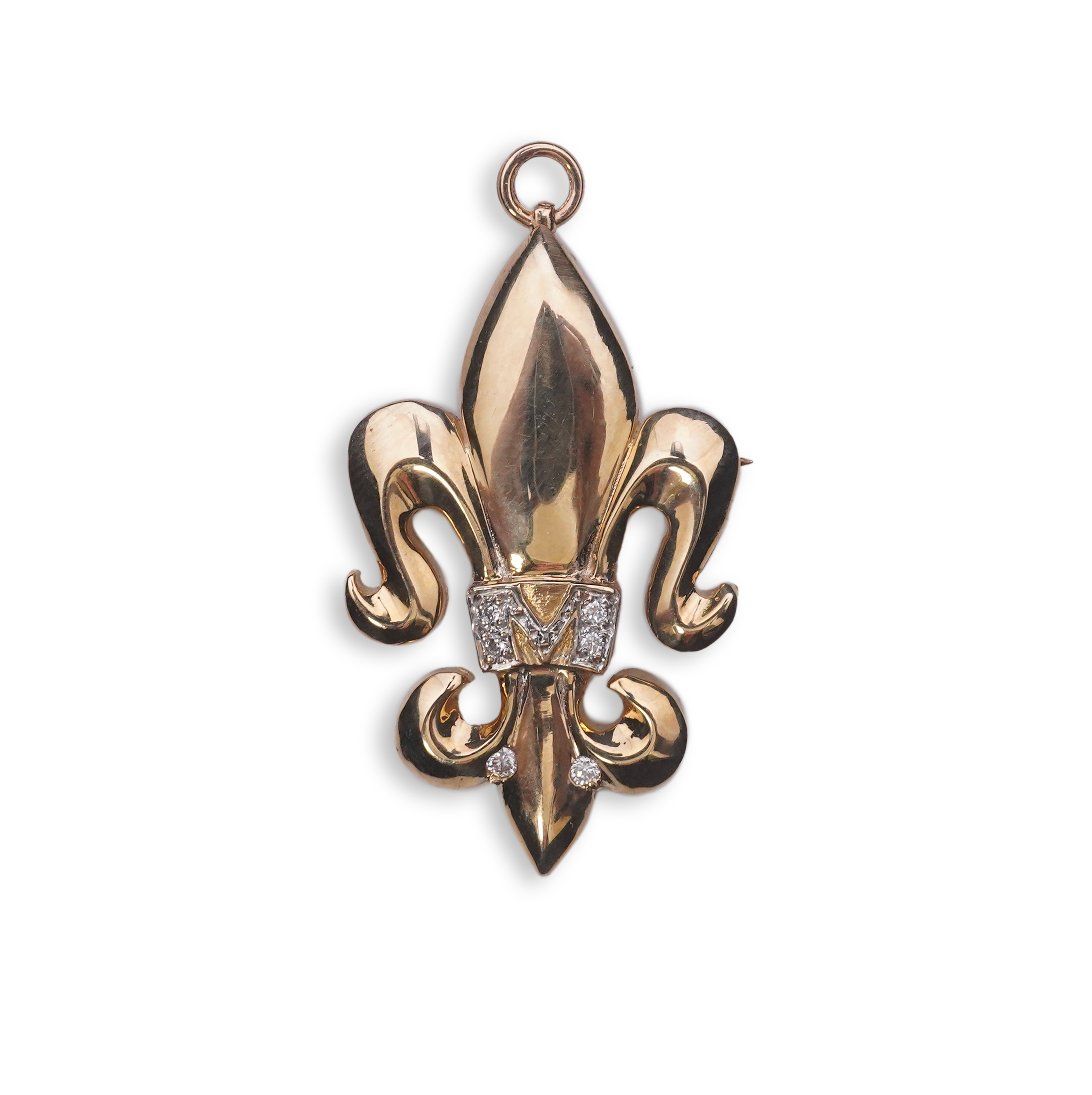 A gold and diamond pendant/brooch